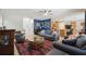 Open concept living room with kitchen view and nautical theme at 15889 Viscount Cir, Port Charlotte, FL 33981