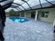 Enjoy this refreshing screened pool at 14364 Appleton Blvd, Port Charlotte, FL 33981