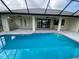 Inviting screened pool and patio at 14364 Appleton Blvd, Port Charlotte, FL 33981