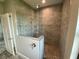 Large walk-in shower with glass enclosure and tile surround at 14364 Appleton Blvd, Port Charlotte, FL 33981