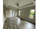 Main bedroom with backyard access and tray ceiling at 14364 Appleton Blvd, Port Charlotte, FL 33981