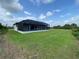 Single-story home with pool and spacious backyard at 14364 Appleton Blvd, Port Charlotte, FL 33981