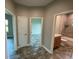Bathroom with toilet, bathtub and vanity at 14364 Appleton Blvd, Port Charlotte, FL 33981