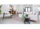 Modern living room features light colored couch and contemporary decor at 11042 Carnegie Ave, Englewood, FL 34224