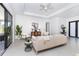 Bright living room with light beige couch and modern decor at 11042 Carnegie Ave, Englewood, FL 34224