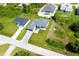 Aerial view of two new homes and surrounding area at 11042 Carnegie Ave, Englewood, FL 34224