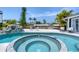 Relaxing circular spa adjacent to the refreshing swimming pool at 245 Spaniards Rd, Placida, FL 33946
