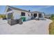 Single-story home with a carport and well-manicured yard at 245 Spaniards Rd, Placida, FL 33946