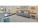 Living room with comfortable seating and view of the backyard at 245 Spaniards Rd, Placida, FL 33946