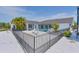 Backyard oasis with a fenced pool and spa area at 245 Spaniards Rd, Placida, FL 33946