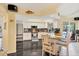 Spacious kitchen with granite countertops and stainless steel appliances at 245 Spaniards Rd, Placida, FL 33946