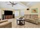 Relaxing living room with comfortable seating and large TV at 245 Spaniards Rd, Placida, FL 33946