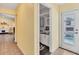 Small bathroom with sink, toilet and access to the pool at 245 Spaniards Rd, Placida, FL 33946