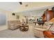 Spacious living room featuring comfortable seating and a view into the kitchen at 245 Spaniards Rd, Placida, FL 33946