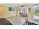 Cozy breakfast nook with tiled floor and view to backyard at 245 Spaniards Rd, Placida, FL 33946