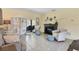Living room featuring a fireplace, comfortable seating, and access to patio at 245 Spaniards Rd, Placida, FL 33946