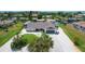 Aerial view of waterfront home with boat lift and RV parking at 245 Spaniards Rd, Placida, FL 33946