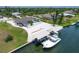 Property features boat lift, covered boat storage, and RV parking at 245 Spaniards Rd, Placida, FL 33946