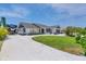 Modern home exterior with landscaped yard and RV parking at 245 Spaniards Rd, Placida, FL 33946