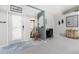 Bright and airy entryway with decorative elements and a view into the living area at 123 Antis Dr, Rotonda West, FL 33947