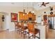 Kitchen boasts a breakfast bar and modern appliances at 14091 Peekskill Ave, Port Charlotte, FL 33981