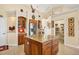Island kitchen features granite counters and stainless steel appliances at 14091 Peekskill Ave, Port Charlotte, FL 33981