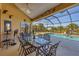 Inviting screened-in pool area with patio furniture at 14091 Peekskill Ave, Port Charlotte, FL 33981