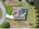Bird's eye view of home with unique roofline and pool at 14091 Peekskill Ave, Port Charlotte, FL 33981