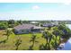 Single Gathering home with pool and canal view from above at 14091 Peekskill Ave, Port Charlotte, FL 33981