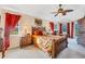 Relaxing bedroom with a comfortable bed and tropical decor at 14091 Peekskill Ave, Port Charlotte, FL 33981