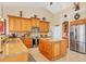 Spacious kitchen with island and granite countertops at 14091 Peekskill Ave, Port Charlotte, FL 33981
