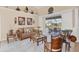 Relaxing living room with sliding doors opening onto a screened patio and pool at 14091 Peekskill Ave, Port Charlotte, FL 33981