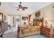Bright main bedroom with a king-size bed and ensuite bathroom access at 14091 Peekskill Ave, Port Charlotte, FL 33981