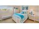 Charming bedroom with a twin-size bed and calming color scheme at 14091 Peekskill Ave, Port Charlotte, FL 33981
