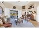Spacious living room with sliding doors leading to a screened patio and pool area at 14091 Peekskill Ave, Port Charlotte, FL 33981