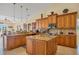 Open kitchen with large island and ample cabinetry at 14091 Peekskill Ave, Port Charlotte, FL 33981