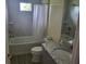 Clean bathroom with a bathtub, shower, and granite vanity at 48 Long Meadow Ln, Rotonda West, FL 33947