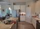 Modern kitchen with white cabinets and granite counters at 48 Long Meadow Ln, Rotonda West, FL 33947