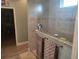 Bathroom with a large walk-in shower and granite countertop at 48 Long Meadow Ln, Rotonda West, FL 33947