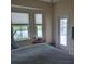 Main bedroom with backyard access and plenty of natural light at 48 Long Meadow Ln, Rotonda West, FL 33947