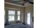 Main bedroom with backyard access and plenty of natural light at 48 Long Meadow Ln, Rotonda West, FL 33947