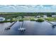 Aerial view of waterfront homes and private boat docks at 14234 River Beach Dr, Port Charlotte, FL 33953