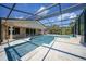 Spacious pool and spa with screened enclosure at 14234 River Beach Dr, Port Charlotte, FL 33953