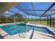 Stunning pool area with spa and screened enclosure at 14234 River Beach Dr, Port Charlotte, FL 33953