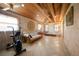 Relaxing exercise room with tiled floors and natural light at 14234 River Beach Dr, Port Charlotte, FL 33953