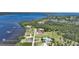 Aerial view of waterfront property with private docks and expansive water views at 14234 River Beach Dr, Port Charlotte, FL 33953