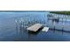 Private boat lift and dock with covered structure at 14234 River Beach Dr, Port Charlotte, FL 33953