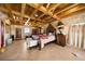 Large bedroom with high wood beam ceiling and tile floors at 14234 River Beach Dr, Port Charlotte, FL 33953
