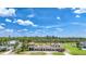 Luxury home with unique architectural design, copper roof, and expansive lawn at 14234 River Beach Dr, Port Charlotte, FL 33953