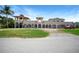 One-story home with unique architectural design, copper roof, and expansive lawn at 14234 River Beach Dr, Port Charlotte, FL 33953